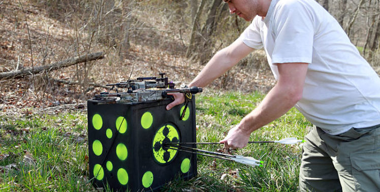 kneeling-pulling-arrows-from-target